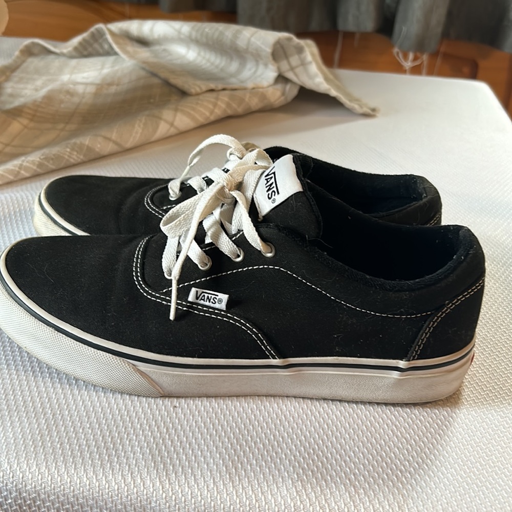 Low top white and black vans size 7 youth. Women’s 8.5